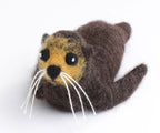 Sample of a needle felted New Zealand Native Seal on a white background