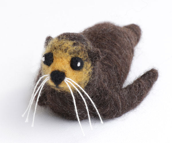 Sample of a needle felted New Zealand Native Seal on a white background