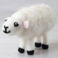 Sample of a needle felted New Zealand Sheep on a white background
