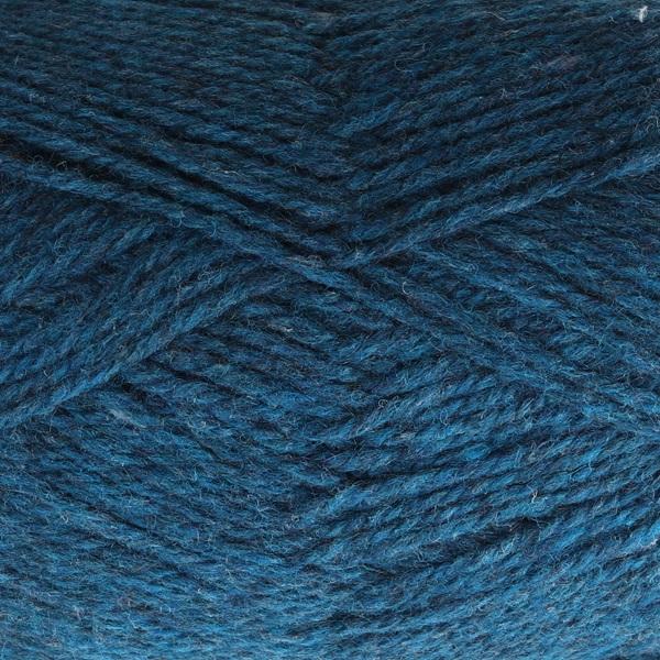 Close-up of bright blue yarn with a tweedy texture