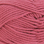 Close-up of pink yarn with visible texture