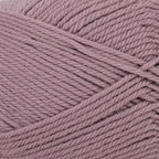 Close-up of pinky-grape yarn with a slight sheen