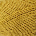 Close-up of mustard yellow yarn with visible texture