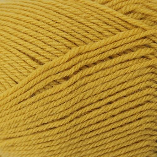 Close-up of mustard yellow yarn with visible texture