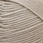 Close-up of beige yarn with visible texture