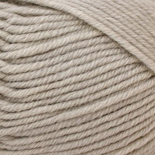 Close-up of beige yarn with visible texture