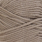 Close-up of beige yarn with visible texture