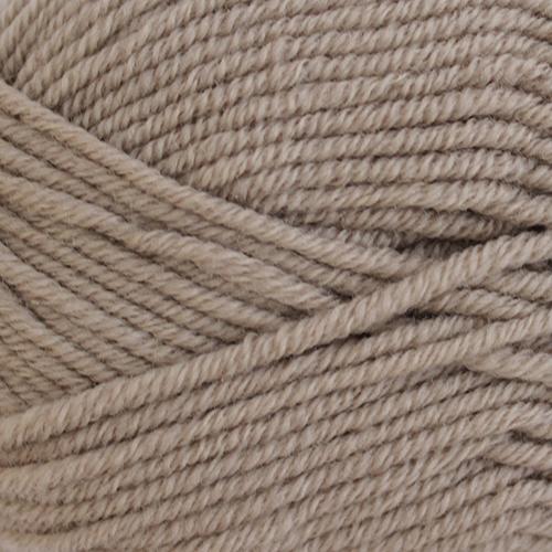Close-up of beige yarn with visible texture