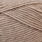 Close-up of beige yarn with a slight texture