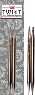 Set of 10 cm long knitting needle tips with packaging labeled 'Twist' on a gray background with floral patterns.