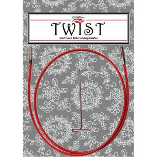 Red lace interchangeable knitting needles on a gray floral patterned background with 'Twist' branding.