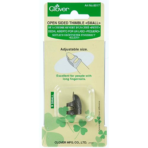 Packaging of Clover C6017 open-sided thimble with an illustration showing the thimble's adjustable size and suitability for long fingernails.