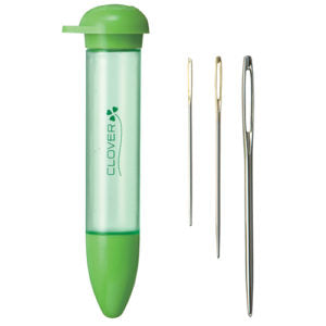 Green needle storage case with needles on a white background
