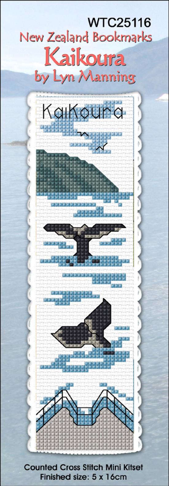 Cross-stitch bookmark kit with whale and mountain design on a white background
