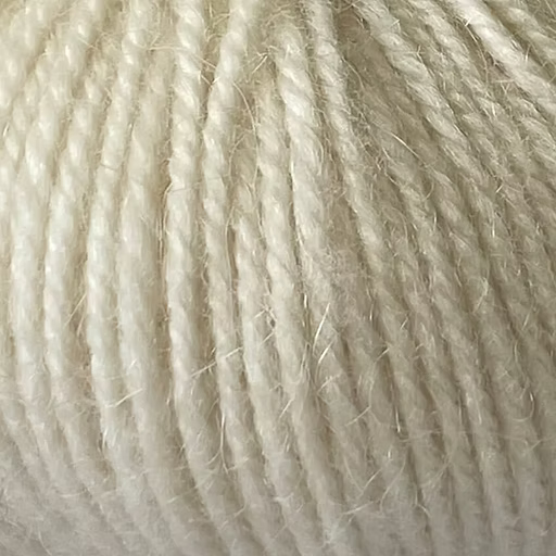 Close-up of natural, undyed yarn with alpaca and merino