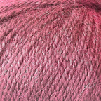 Close-up of bright pink yarn with alpaca and merino