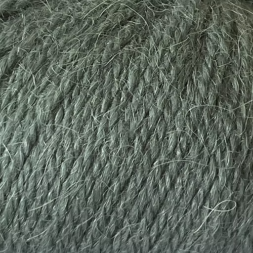 Close-up of dark green yarn with alpaca and merino