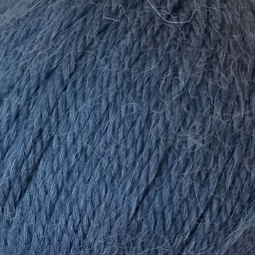 Close-up of medium blue yarn with alpaca and merino