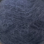Close-up of deep slate blue-grey  colored yarn with a fluffy mohair texture