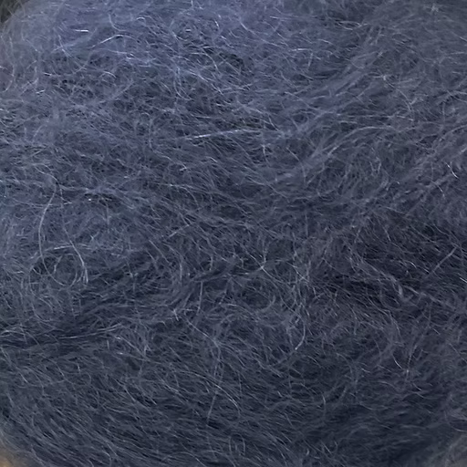 Close-up of deep slate blue-grey  colored yarn with a fluffy mohair texture