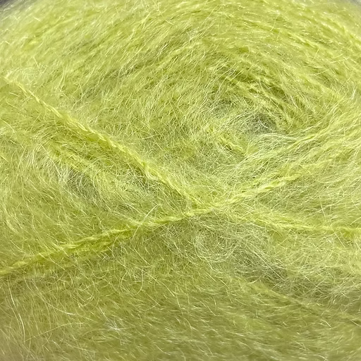 Close-up of chartreuse colored yarn with a fluffy mohair texture