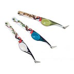 Set of three decorative tweezers with bird designs on a white background