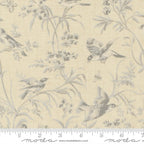 A Quilt fabric featuring a floral and bird design in blue tones on a light blue background, with a ruler at the bottom for scale.