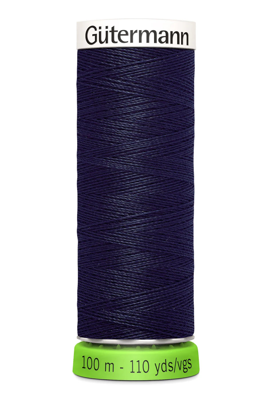 Spool of navy Gutermann thread on a white background