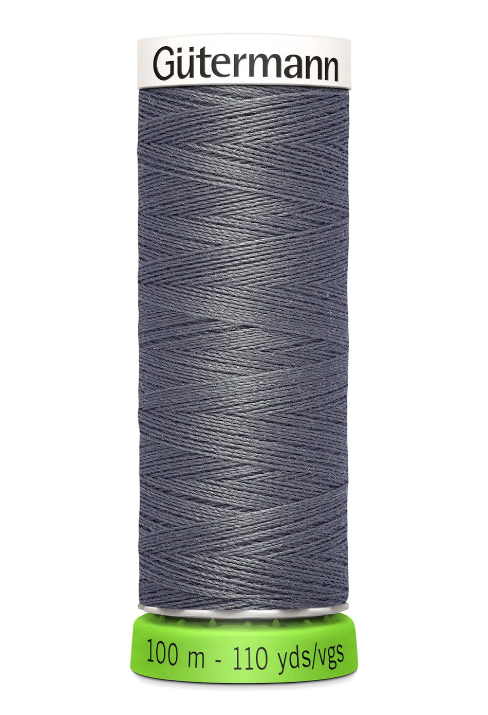 Spool of charcoal Gutermann thread on a white background
