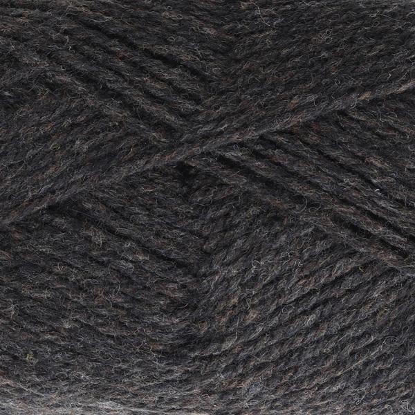 Close-up of dark brown-grey yarn with a tweedy texture