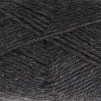 Close-up of dark brown-grey yarn with a tweedy texture
