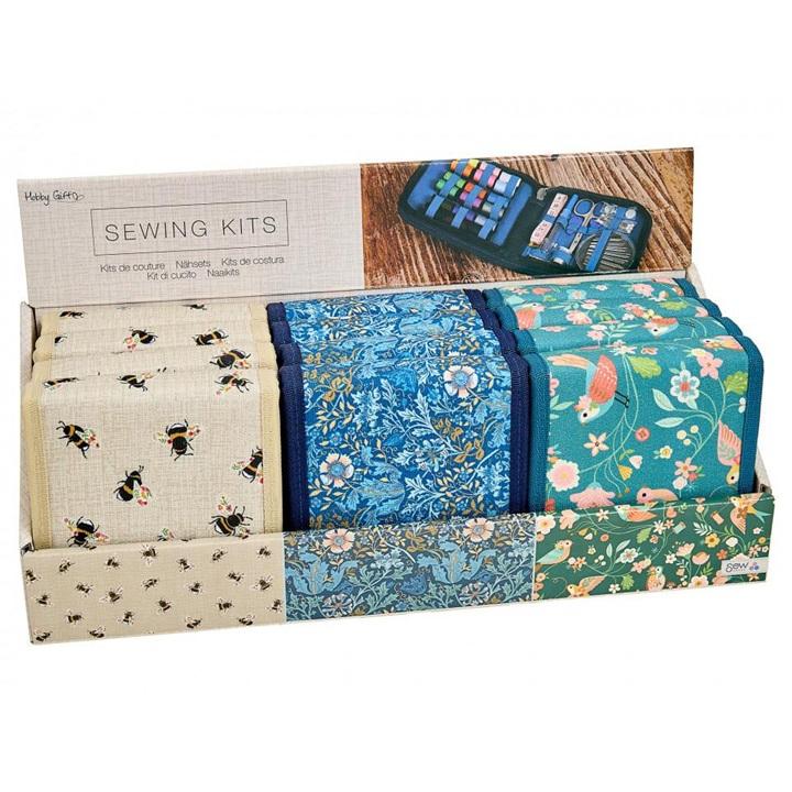 Sewing kit in fabric case on white background