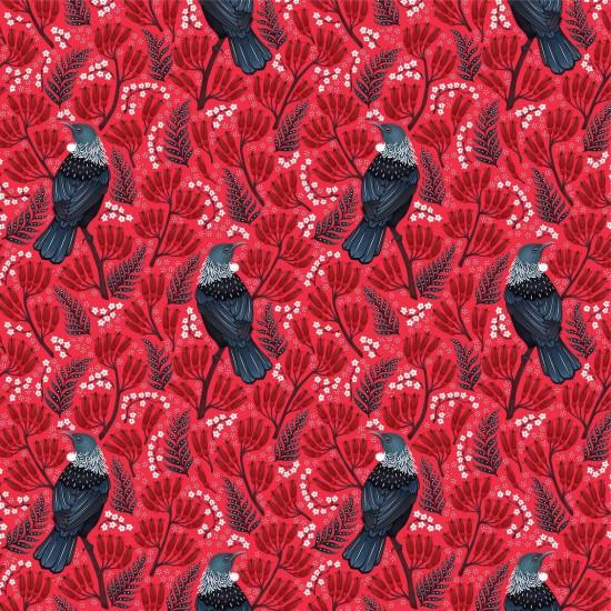 Quilt fabric with a pattern of tui birds on red background with branches and berries