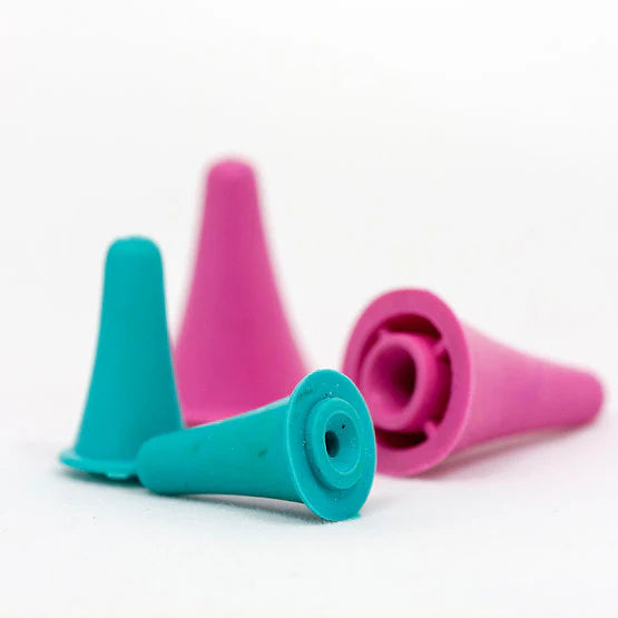 Two teal and two pink knitting point protectors on a white background