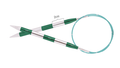 Green and silver circular knitting needles on a white background