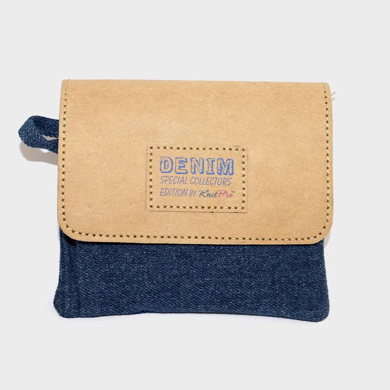 Two-tone wallet with denim front and beige flap on a white background