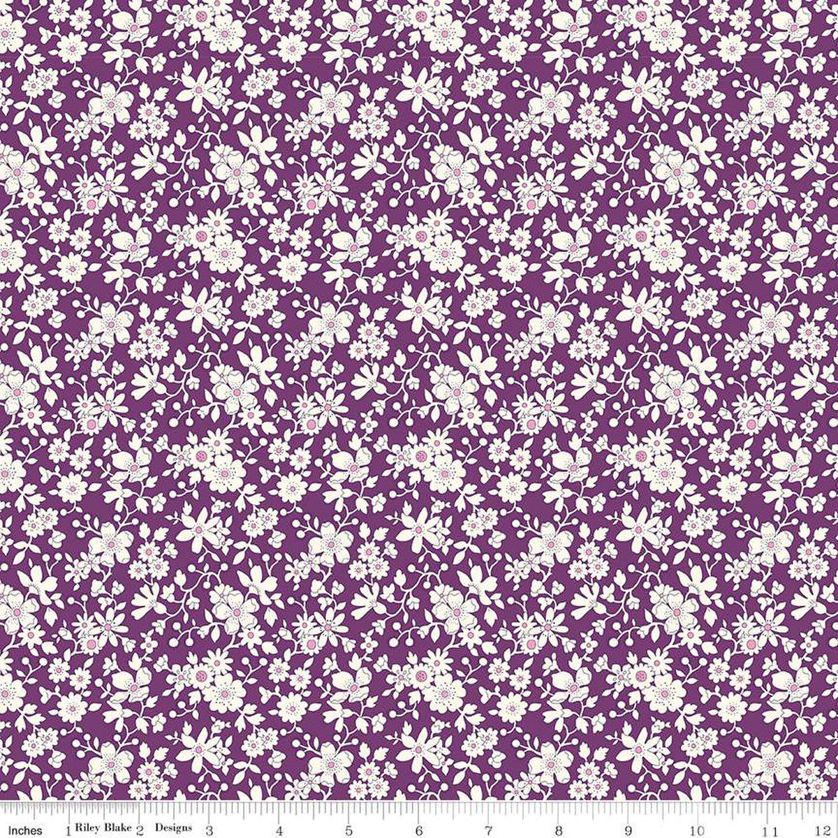 A fabric from the Liberty Fabrics Flower Show Collection featuring a purple background with a white floral Quilt Fabric.