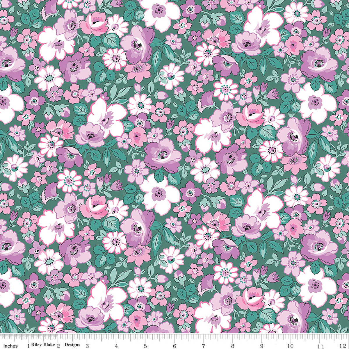 A Liberty of London floral Quilt fabric featuring a repeating design of flowers in pinks and white on a green background.