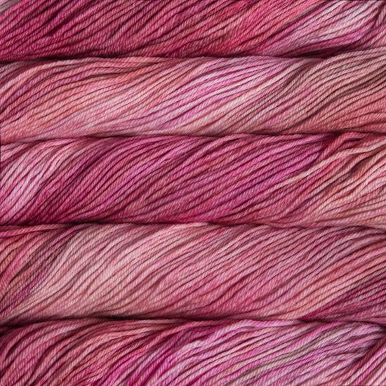 Close-up of multicolored Malabrigo Rios yarn with multi-pink hues.