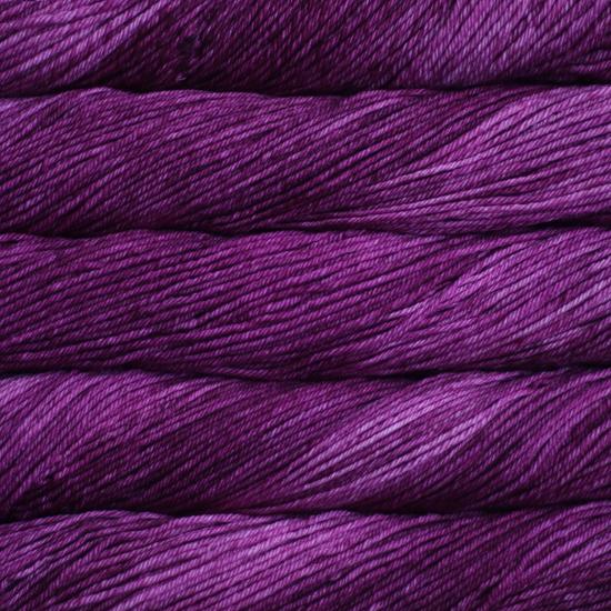 Close-up of multicolored Malabrigo Rios yarn with multi-purple hues.