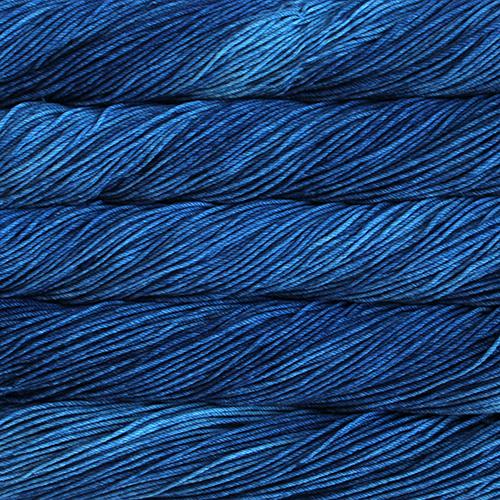 Close-up of multicolored Malabrigo Rios yarn with multi-blue hues.