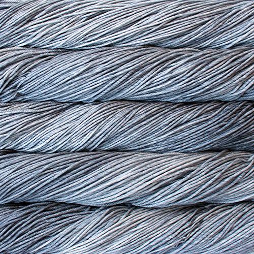 Close-up of multicolored Malabrigo Rios yarn with multi-grey hues.