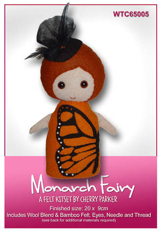 Felt kit packaging for a monarch fairy with butterfly wings and black hat on a pink background.