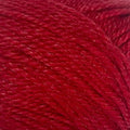 Close-up of a ball of New Zealand possum-blend red yarn