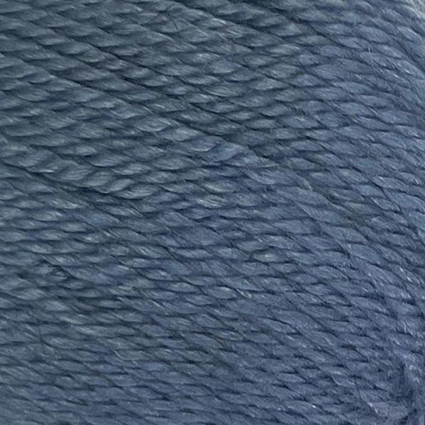 Close-up of a ball of New Zealand possum-blend blue yarn