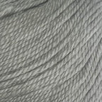 Close-up of a ball of New Zealand possum-blend grey yarn