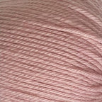 Close-up of a ball of New Zealand possum-blend pink yarn