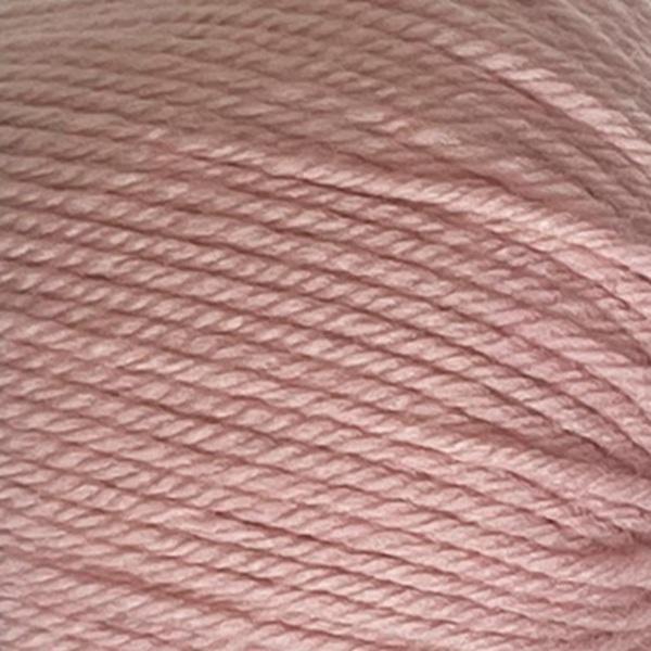 Close-up of a ball of New Zealand possum-blend pink yarn
