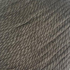 Close-up of a ball of New Zealand possum-blend brown yarn