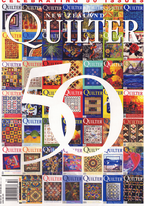 Cover of 'Quilter' magazine celebrating 50 issues with a collage of quilt patterns.